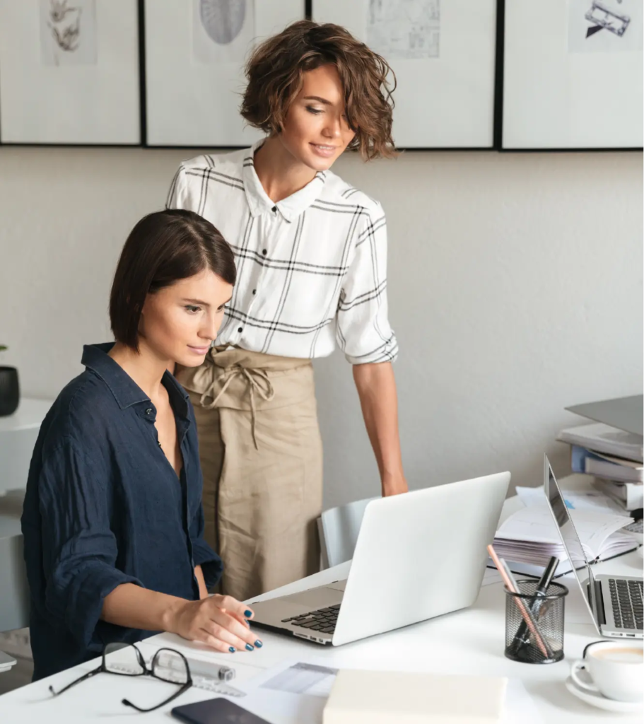 Two women working in a modern office – MBA in Europe